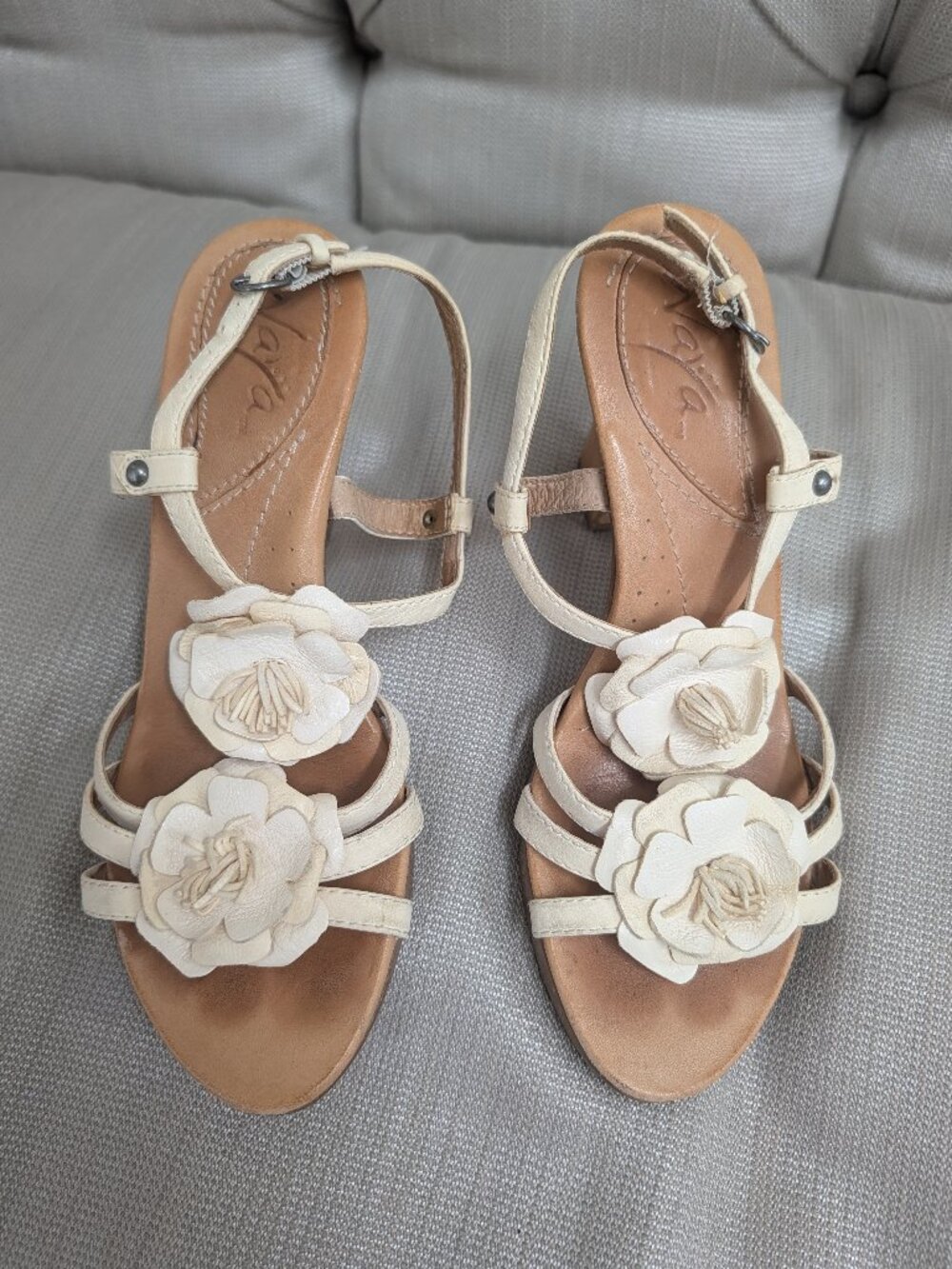 Naya Sandals cream leather straps with floral leather embellishments high heel